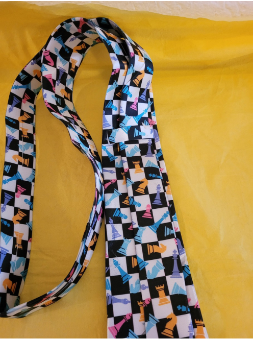 Decorative tie with chess motifs