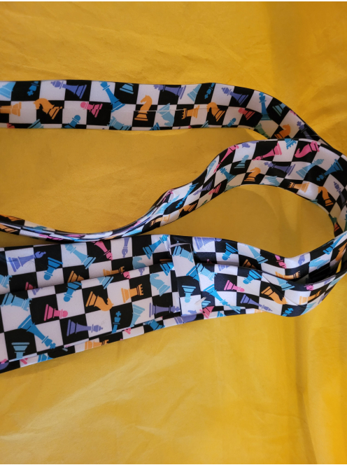 Decorative tie with chess motifs
