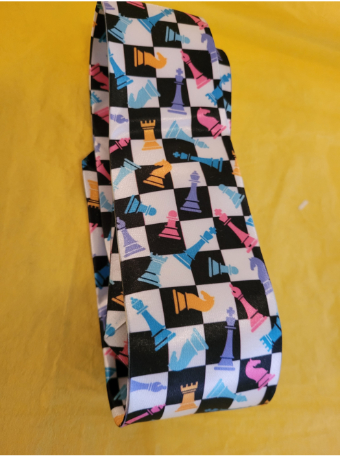 Decorative tie with chess motifs